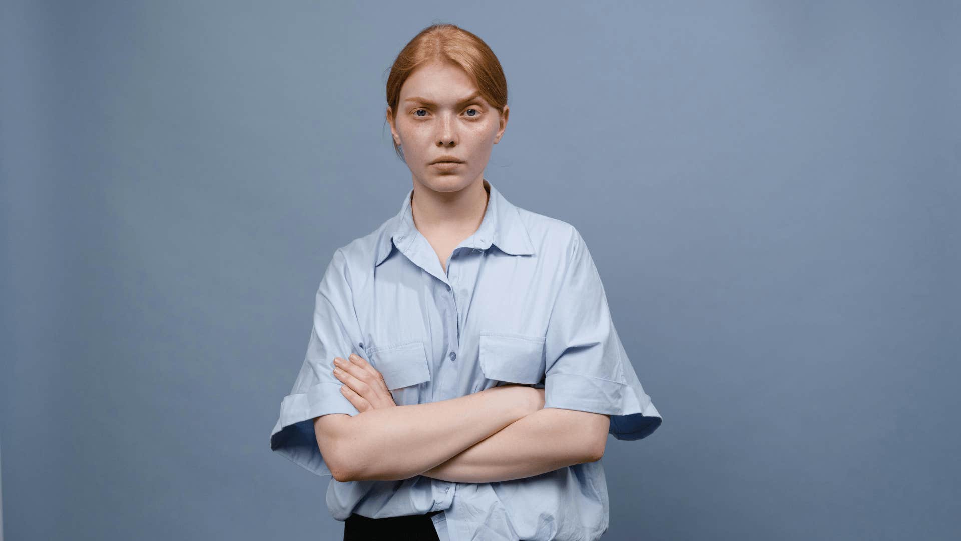 impatient woman with arms crossed