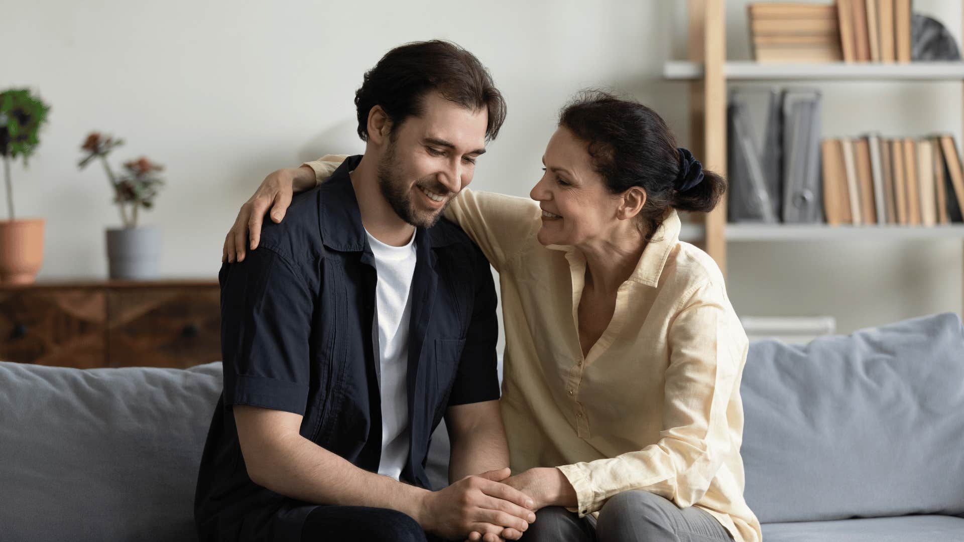 woman comforting man