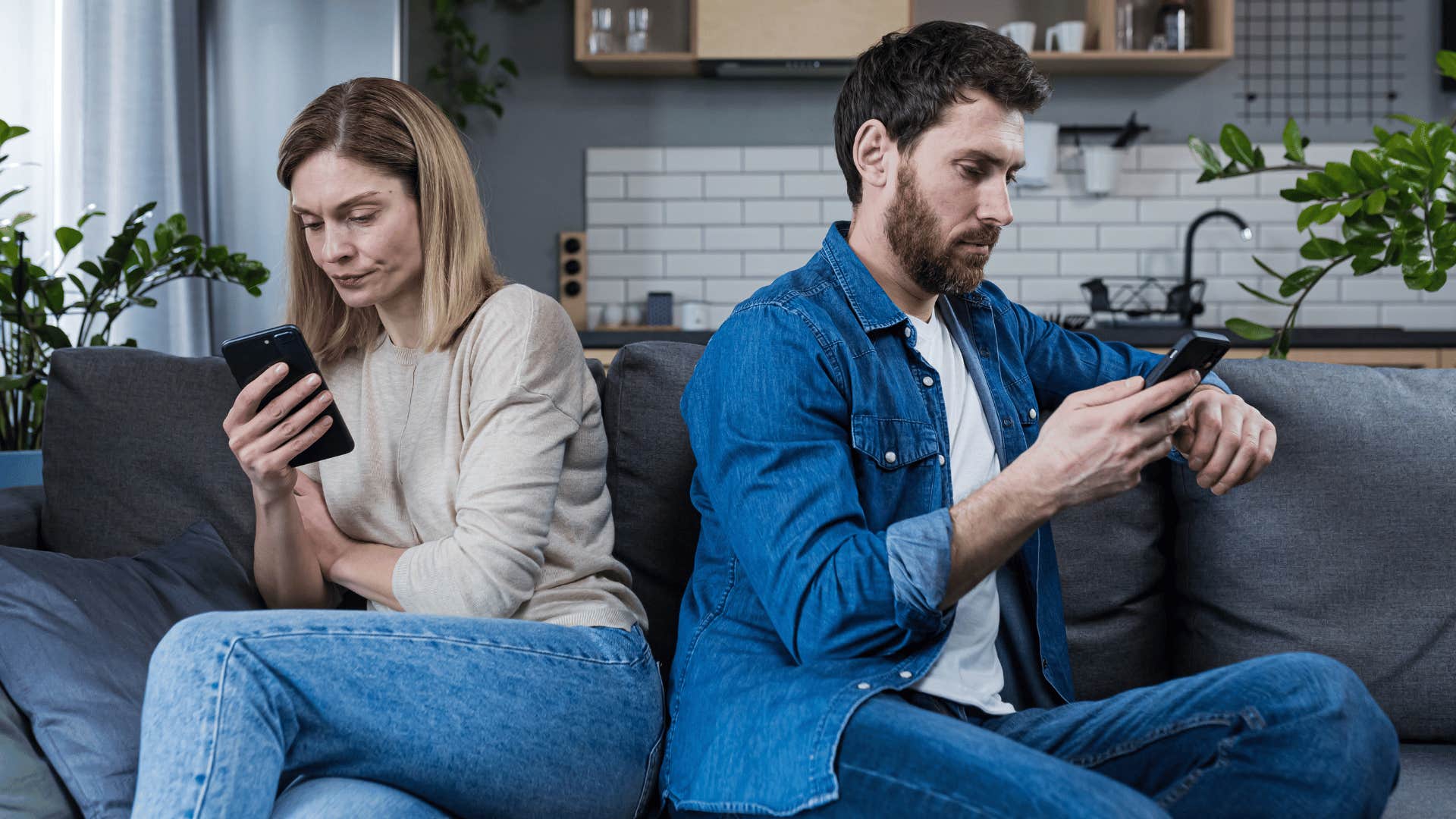 couple on phone ignoring each other 