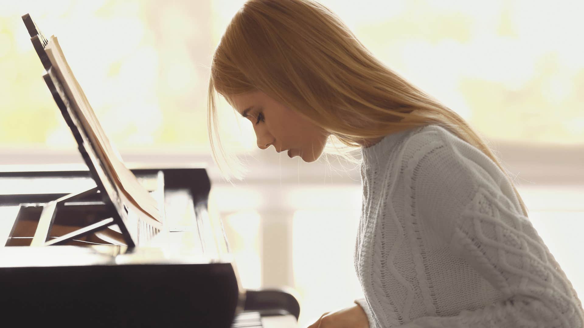 woman playing piano