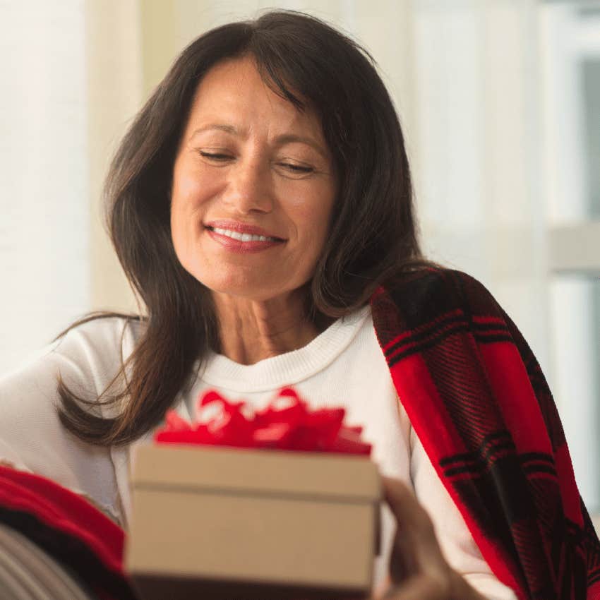 woman holding a gift 