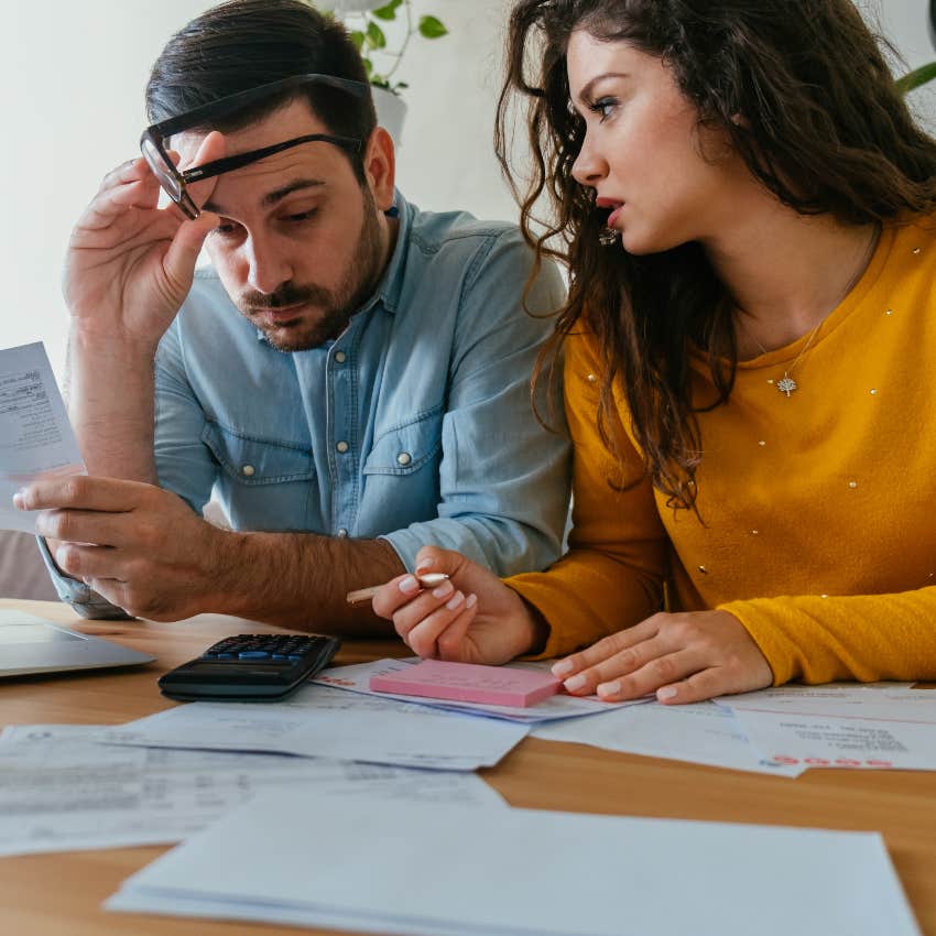 Couple feeling stressed about money