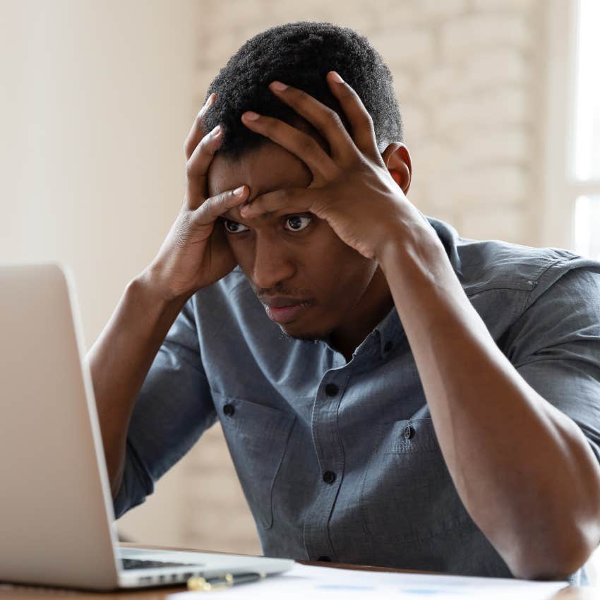 Stressed worker looking over accommodations. 