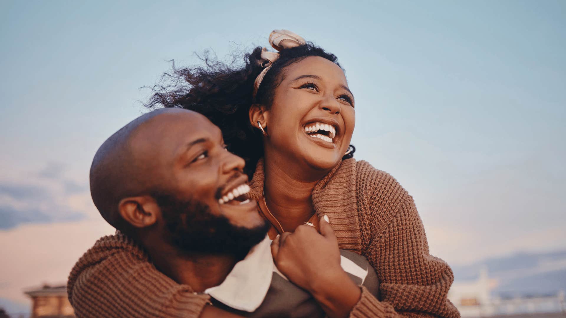 happy couple on the beach 