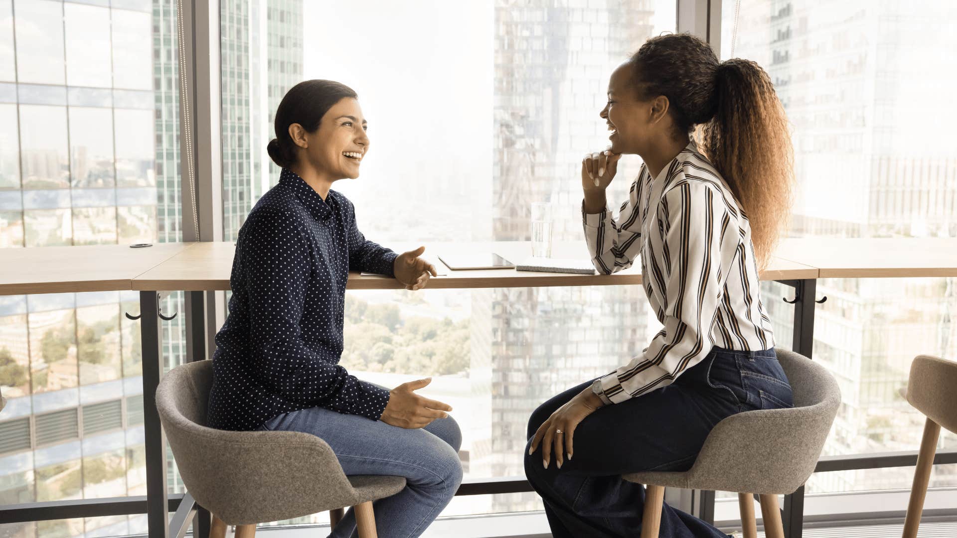 female coworkers talking