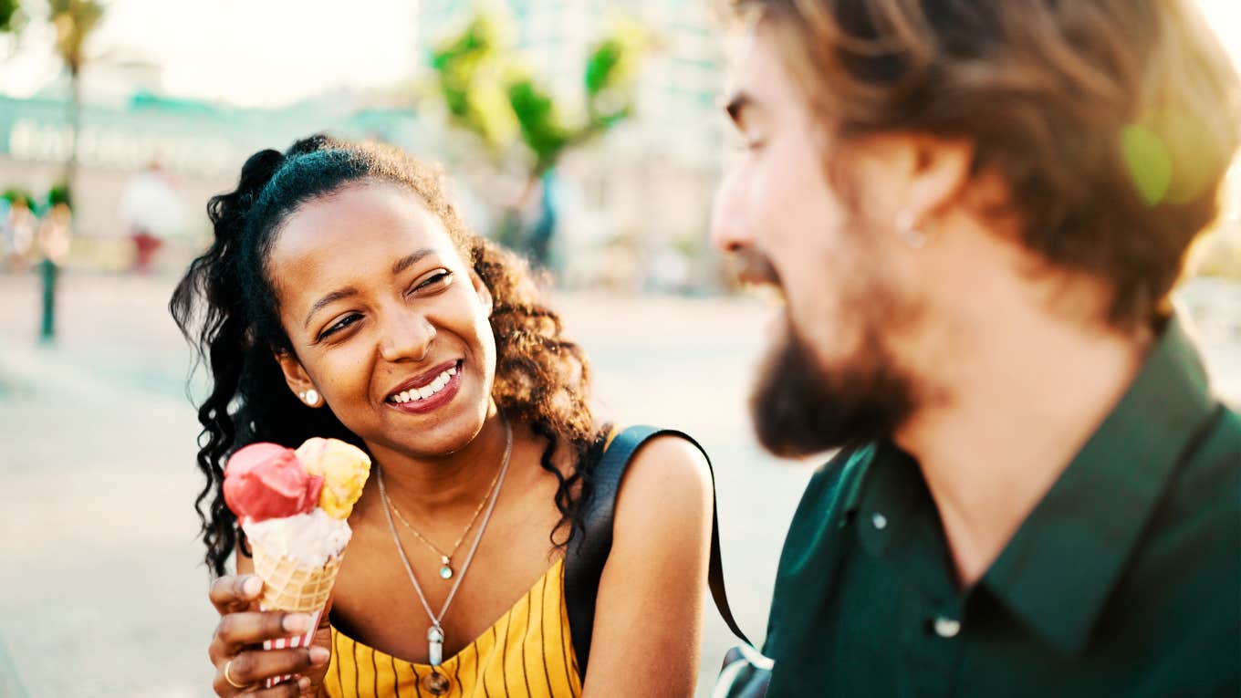 Woman taking advantage of what man in front of her finds attractive