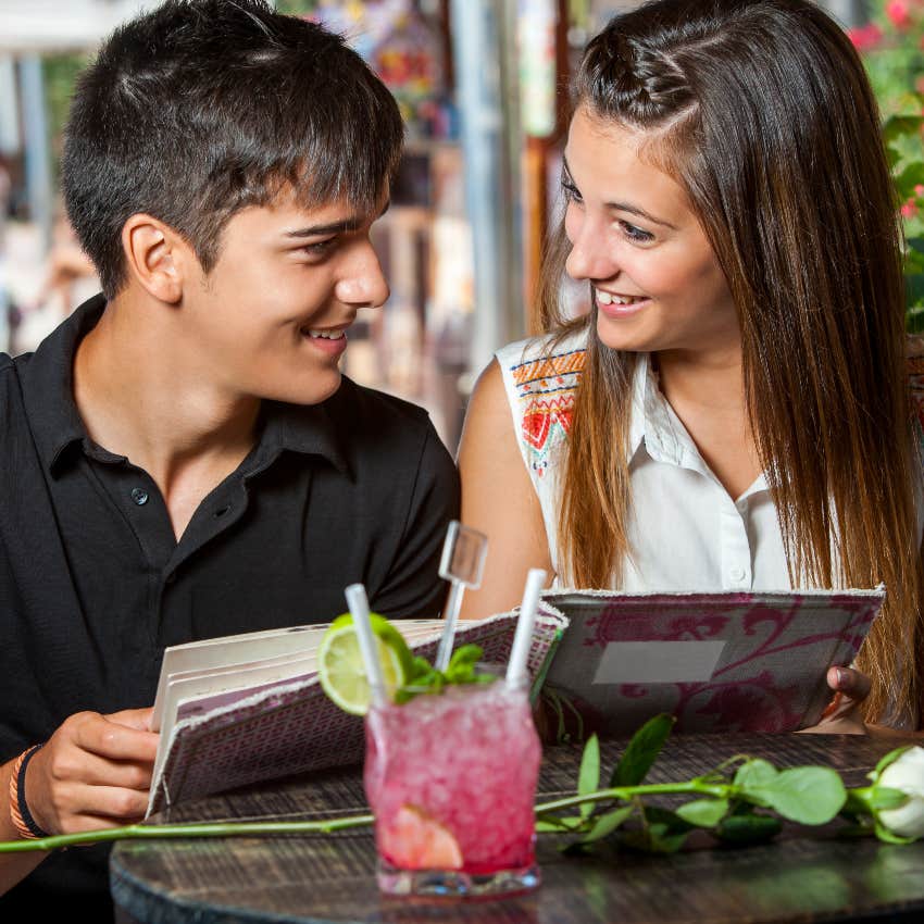 Teen couple at restaurant sitting near entitled customers