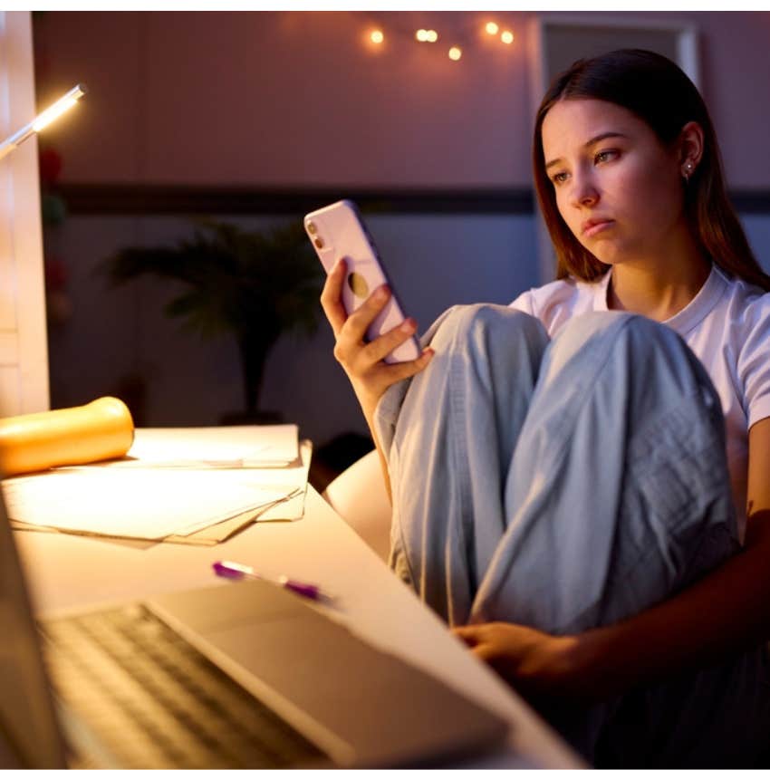 teenager looking at phone 