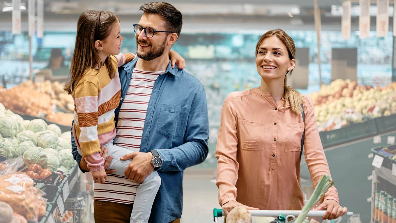 Frugal family shopping for name brand groceries in the store. 