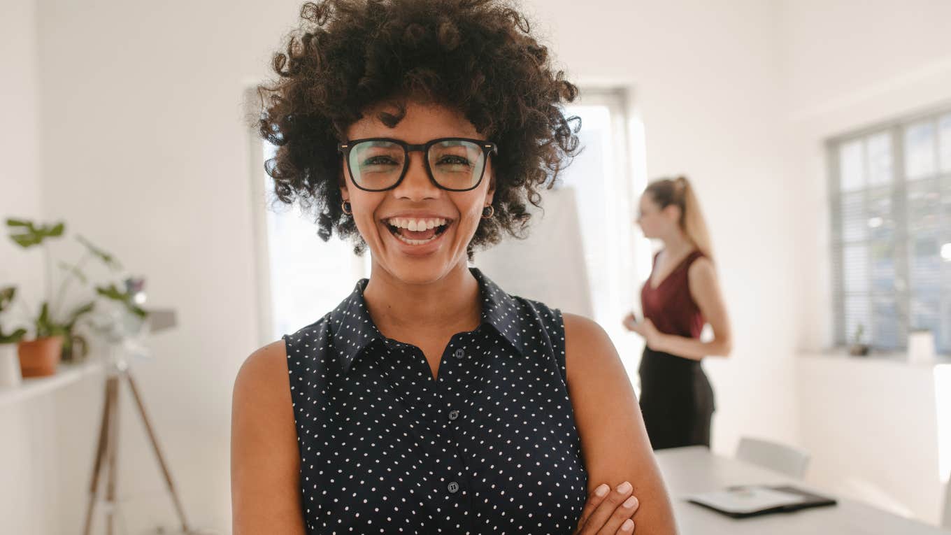 Woman smiling in a job interview.