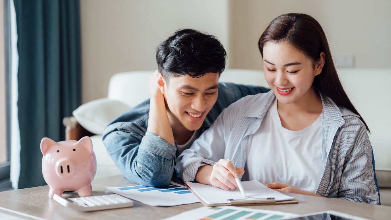 Couple answering financial questions before getting married