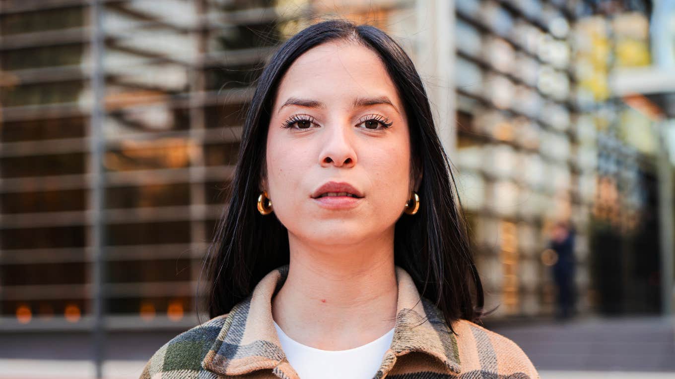 authentic woman looking annoyed with someone's behavior