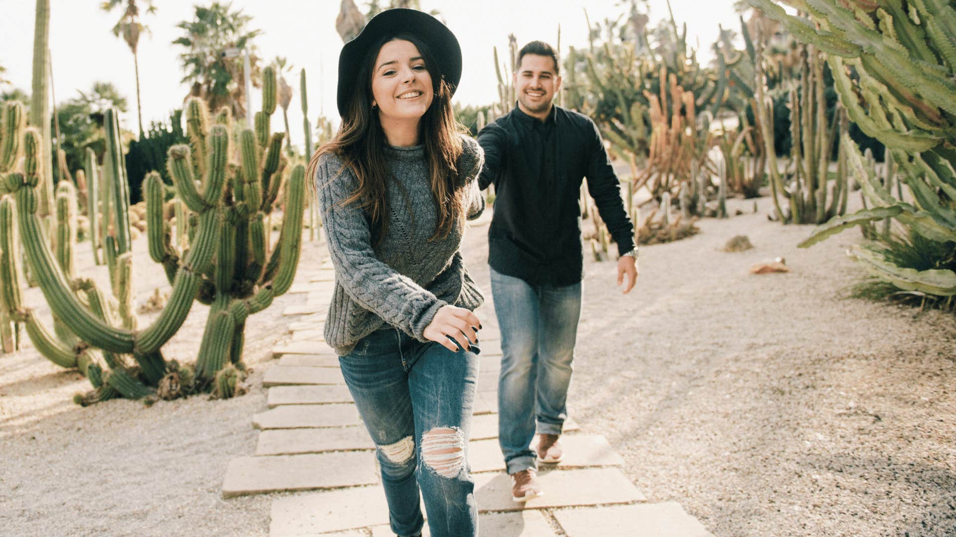 man and woman in desert