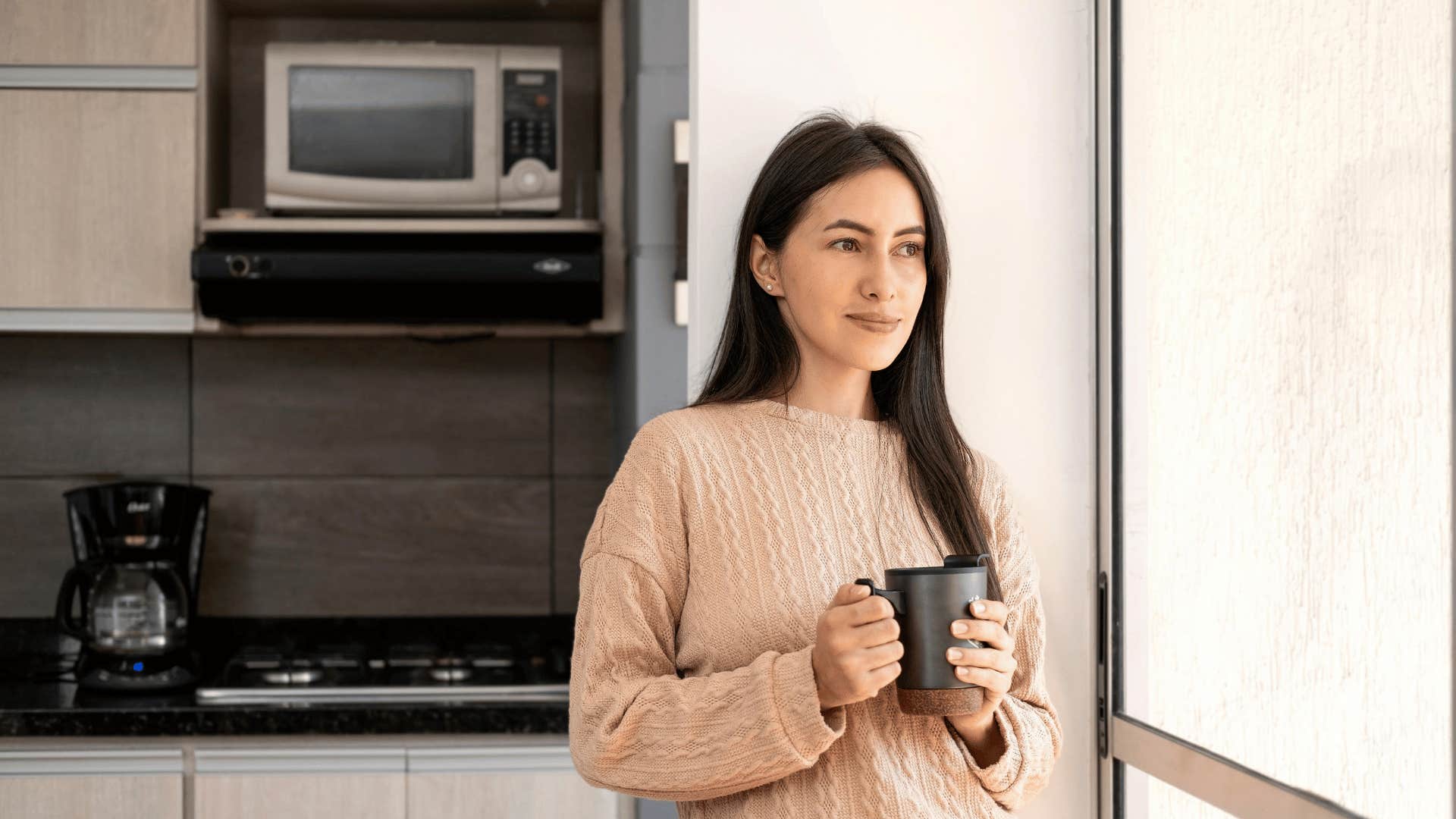 woman drinking coffee