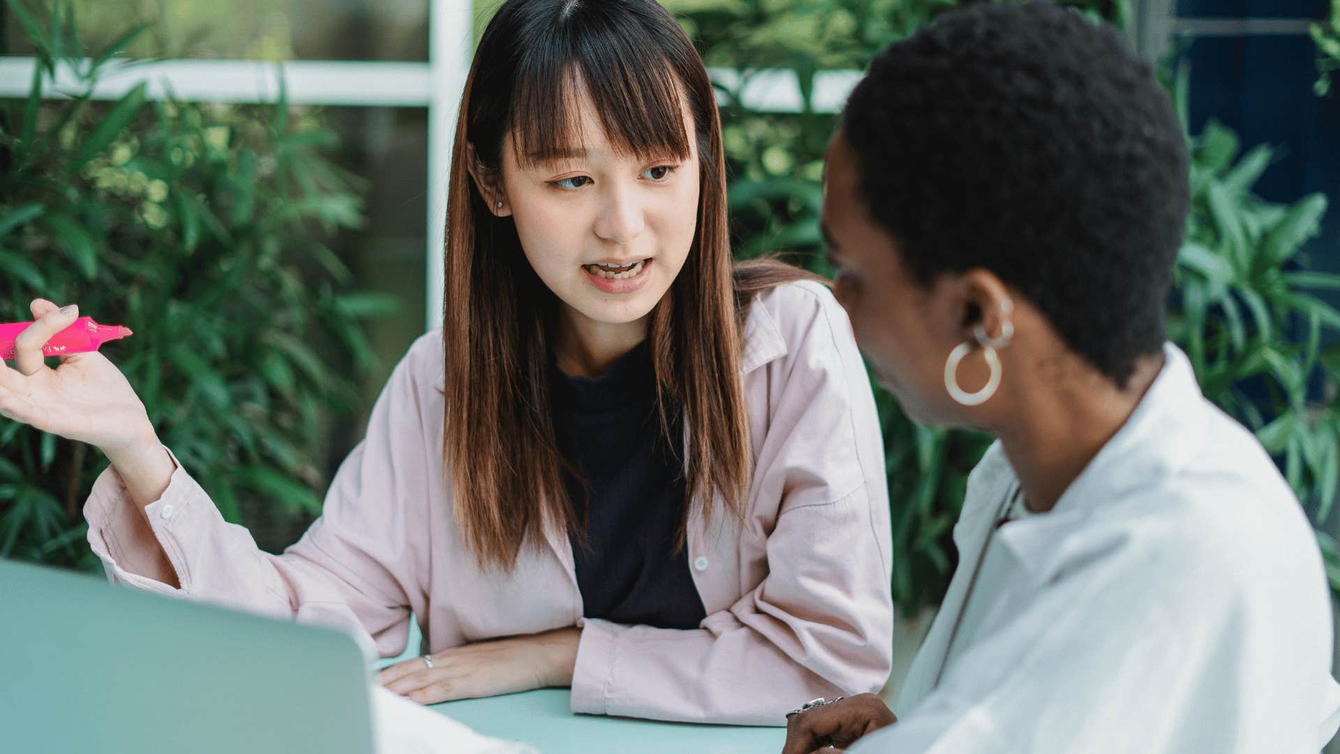 two women talking staying focused on conversation