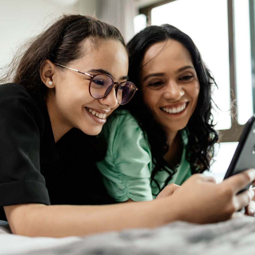 Mother and teen daughter using tech together to avoid hypocrisy