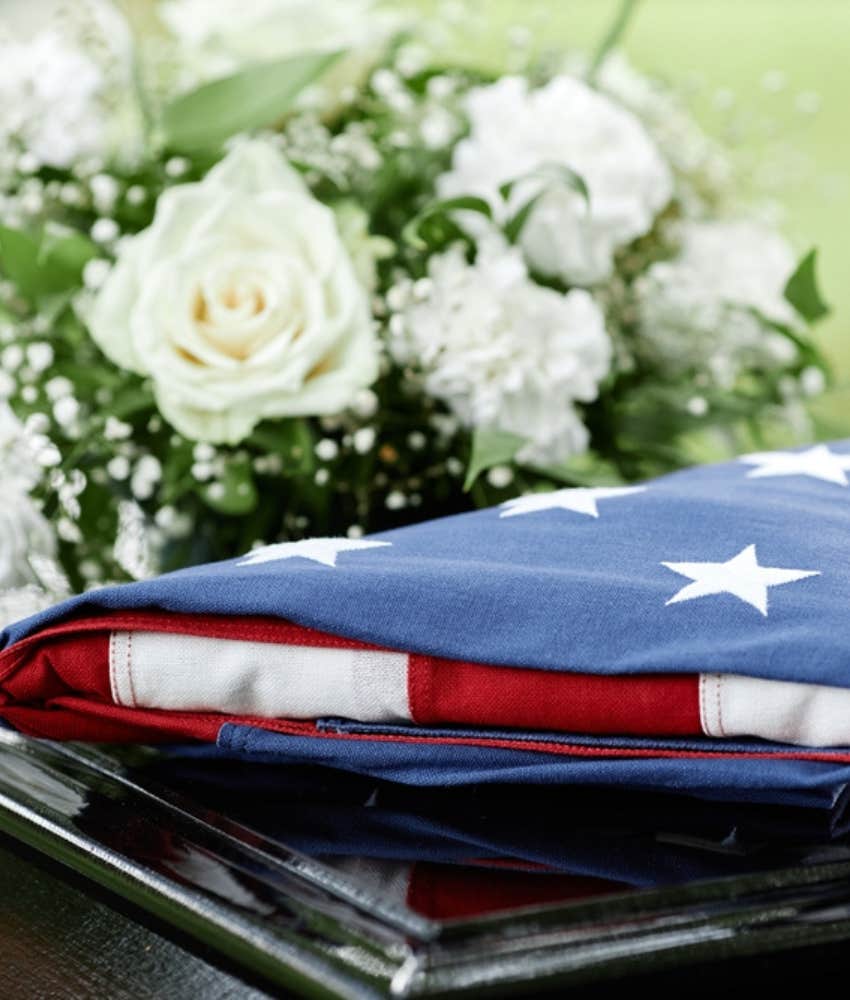 veteran casket with folded U.S. flag