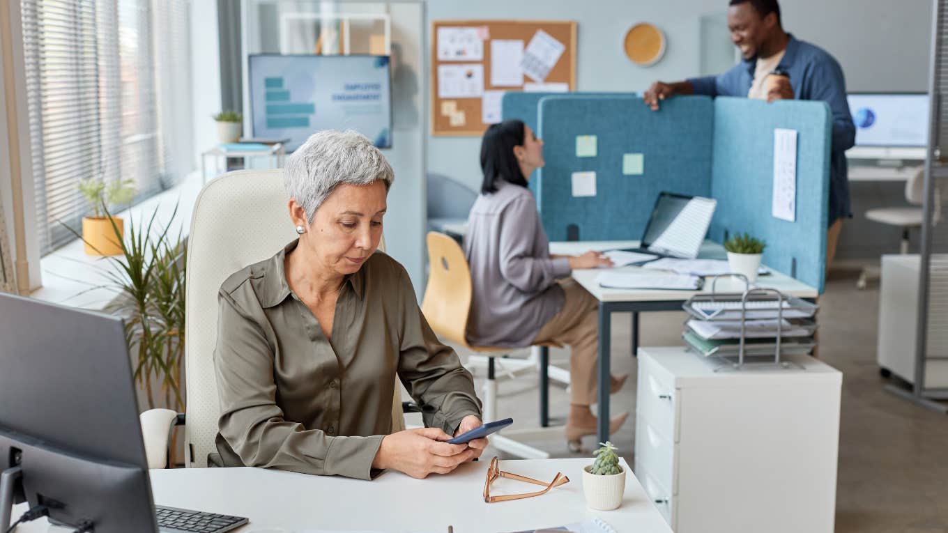 Employees working in cubicles