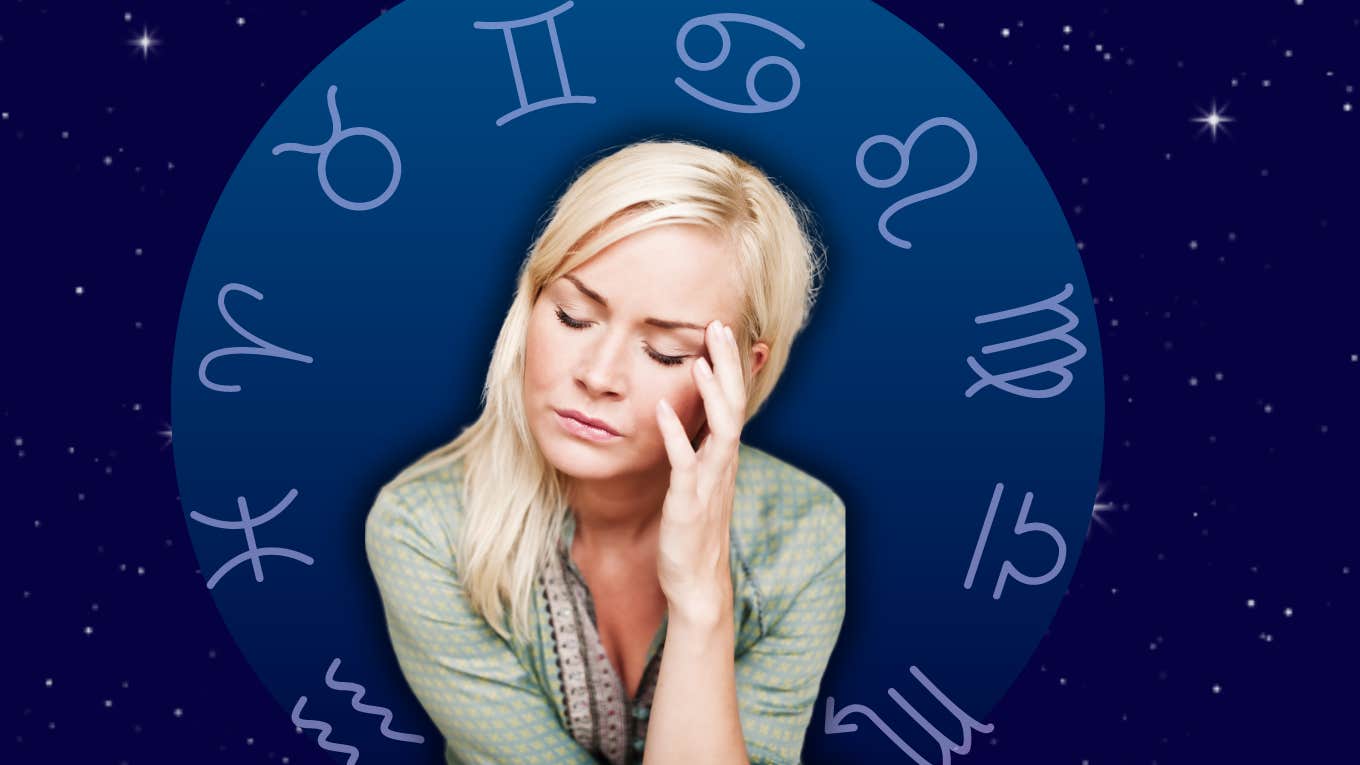 tired woman unable to sleep on zodiac background