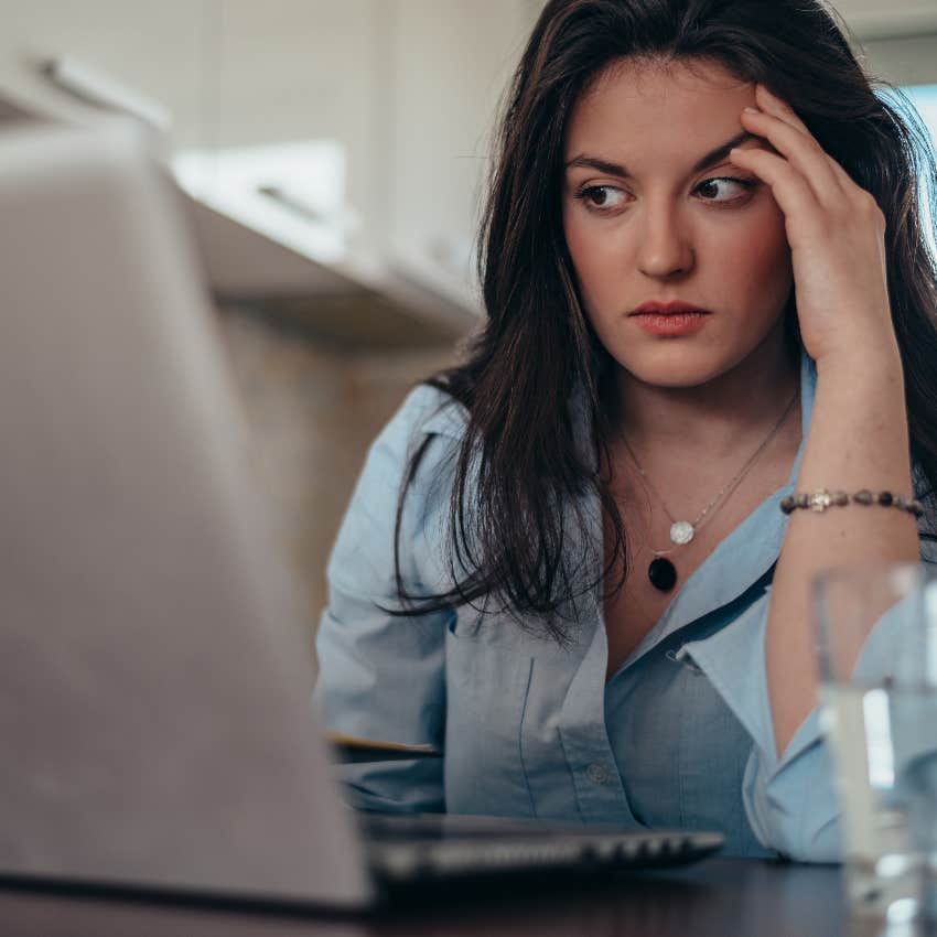 Woman snooping on her husband's computer