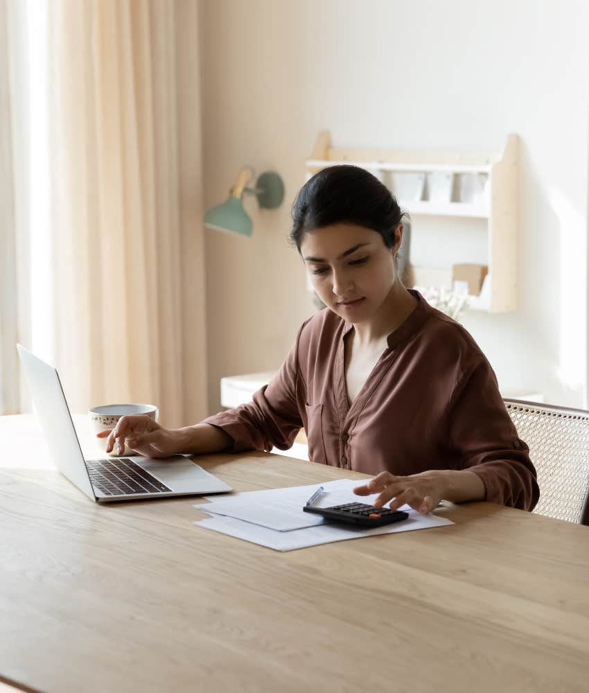 woman going through monthly budget