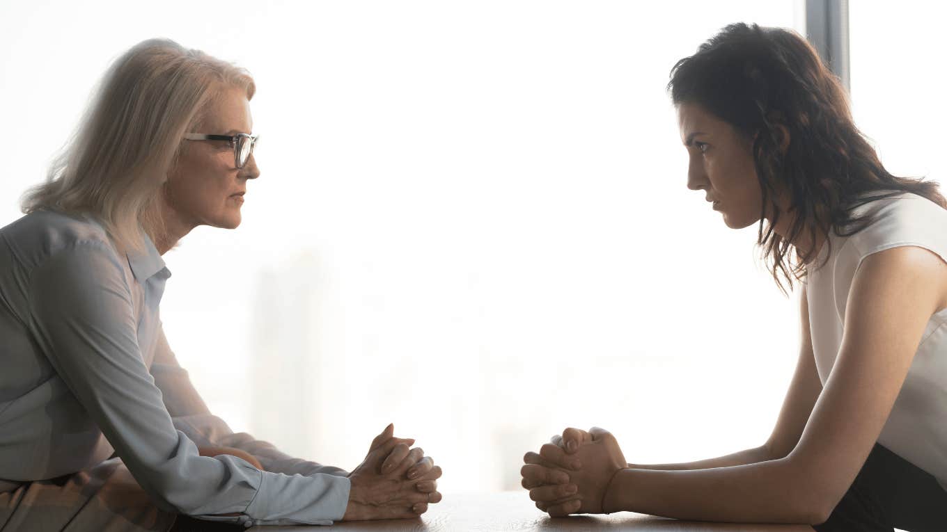 older female worker with younger female worker