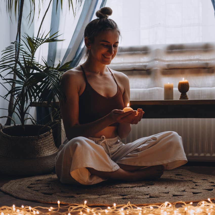 Woman using a mindfulness practice to ground her during a hard time