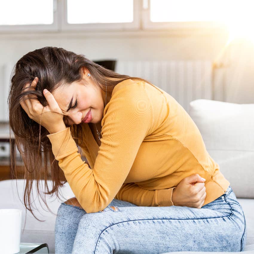 Woman in pain from period cramps