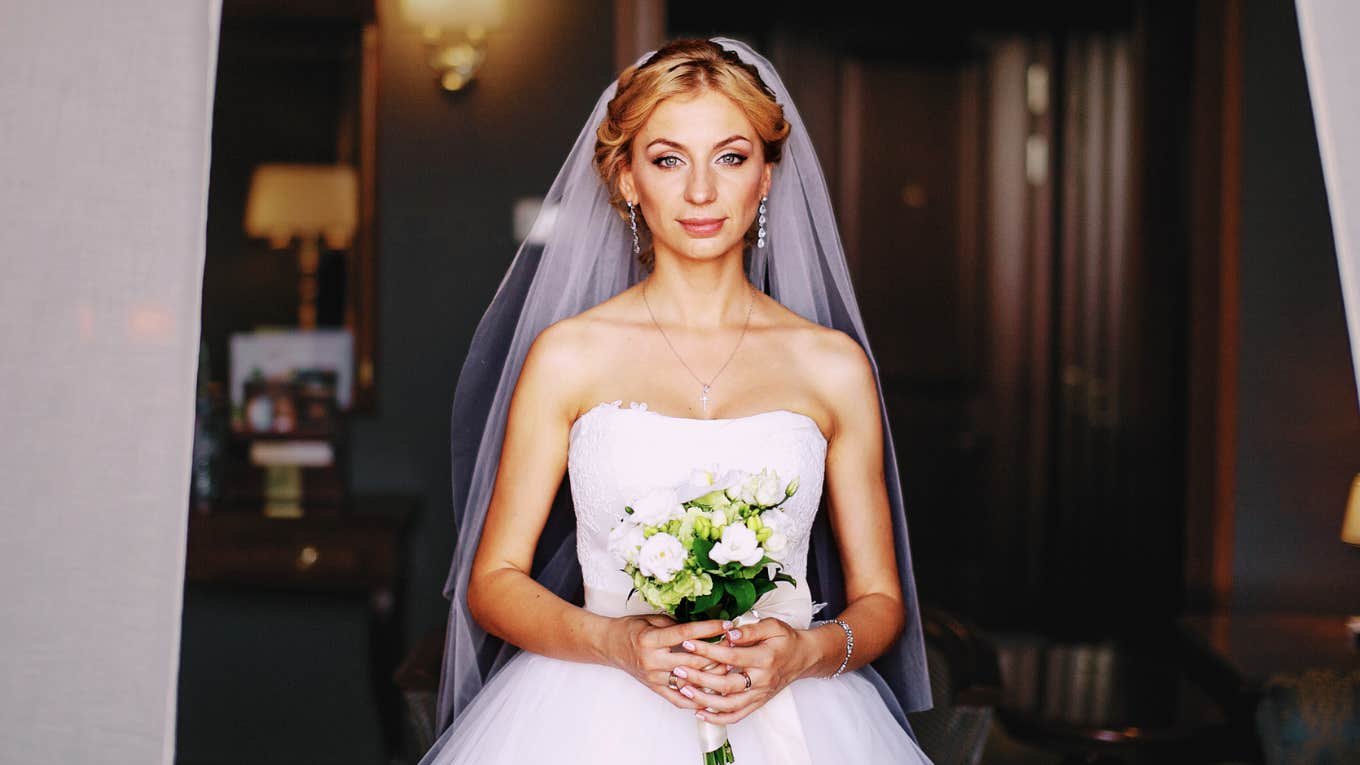 Woman in wedding dress getting married.