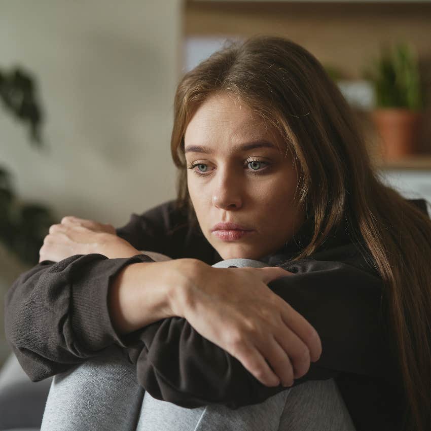 Woman staying quiet while upset to please others