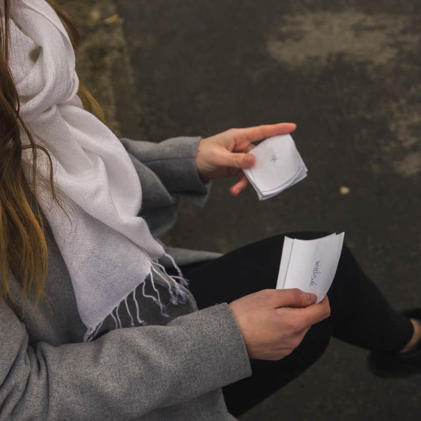 Woman using flashcards to boost her memory