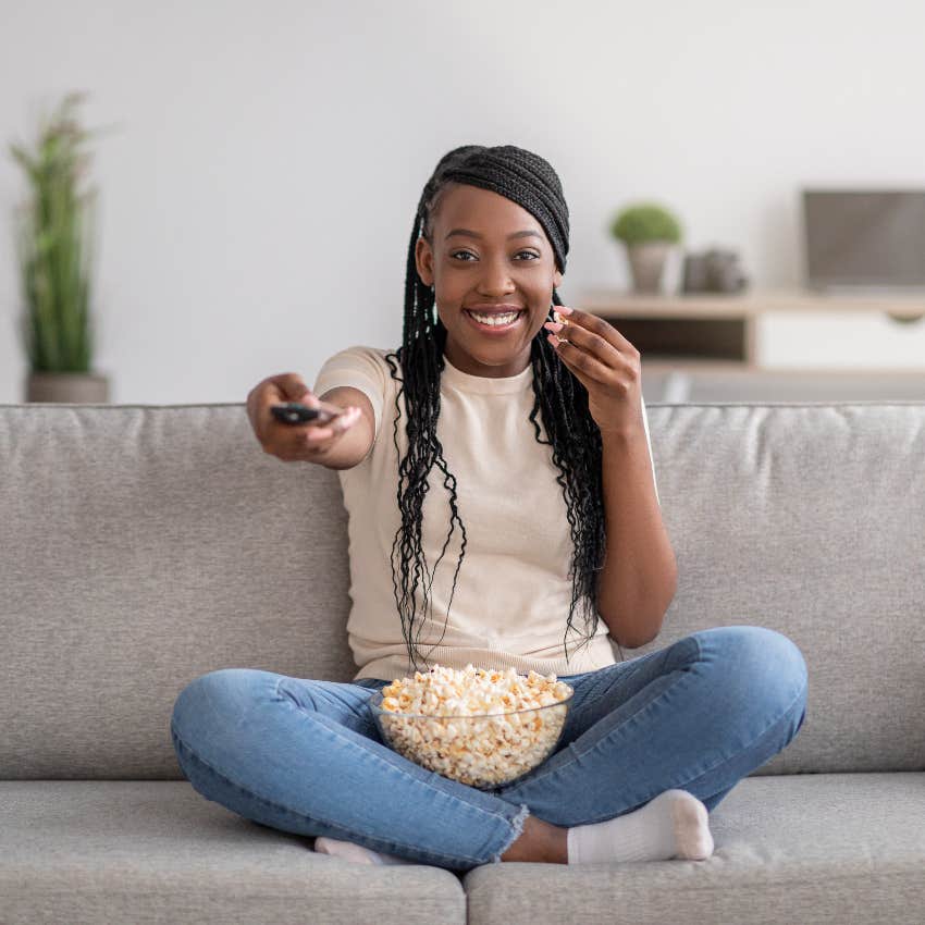 Woman watching a movie because she just couldn't focus