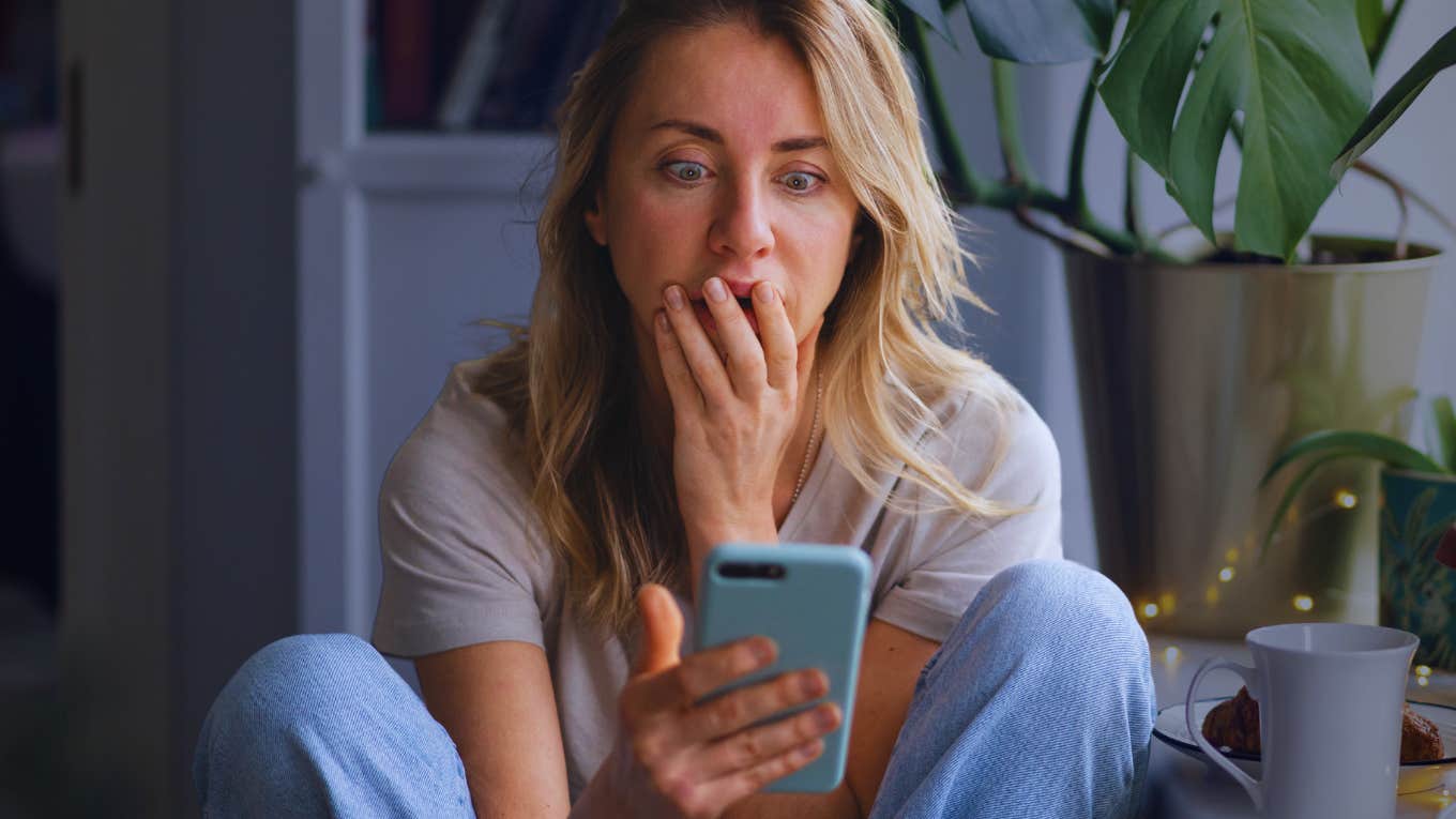 Woman on phone realizes she has subtly been sabotaging her relationship.