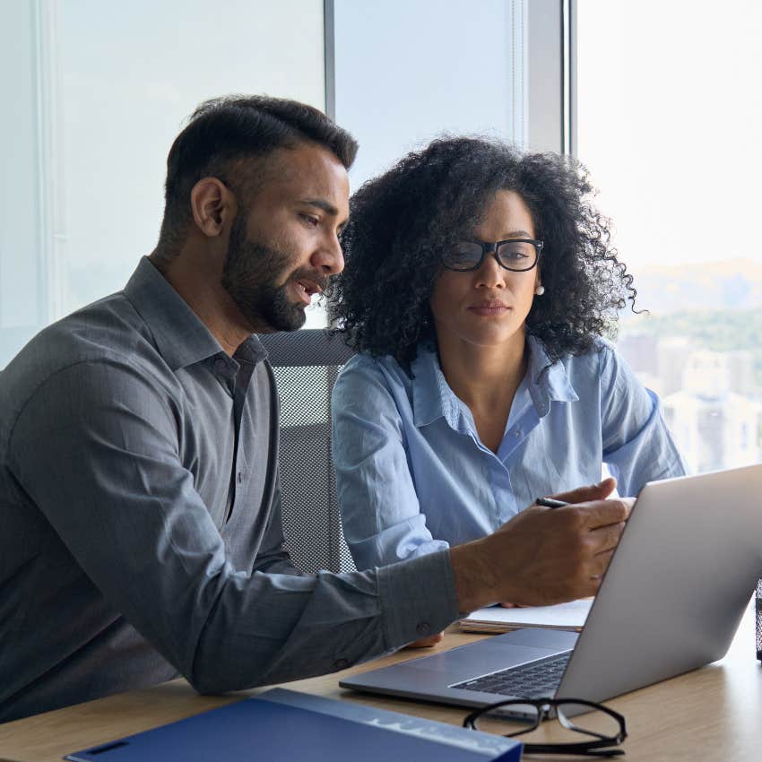 Woman working with someone whose done it so she can become a genius-level thinker