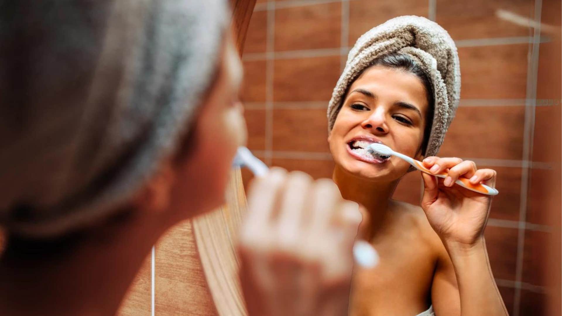 Woman brushes teeth, acknowledges she's a creation of nature