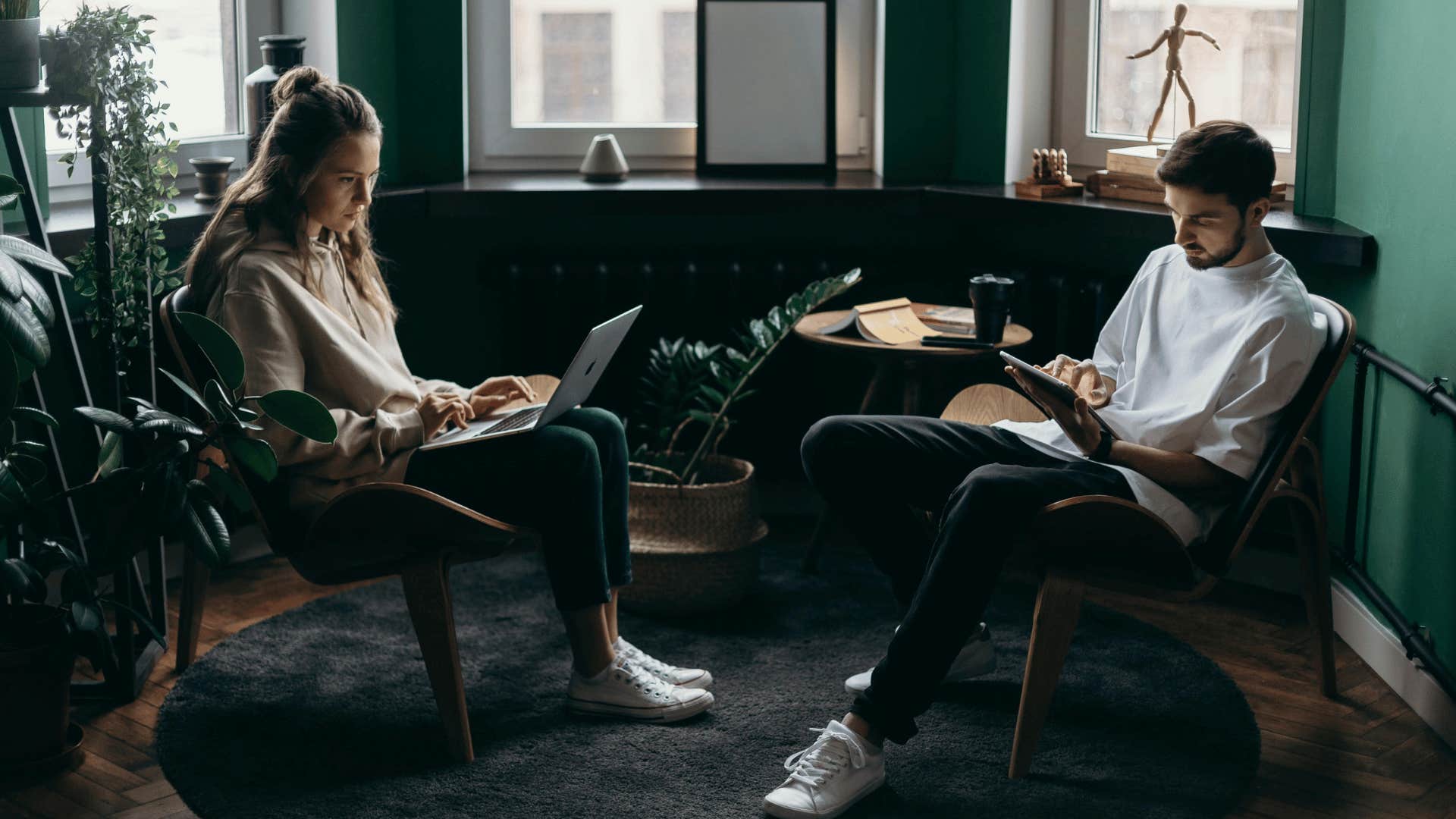 man and woman working together