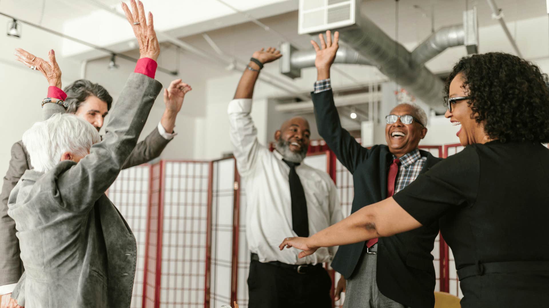 corporate workers cheering