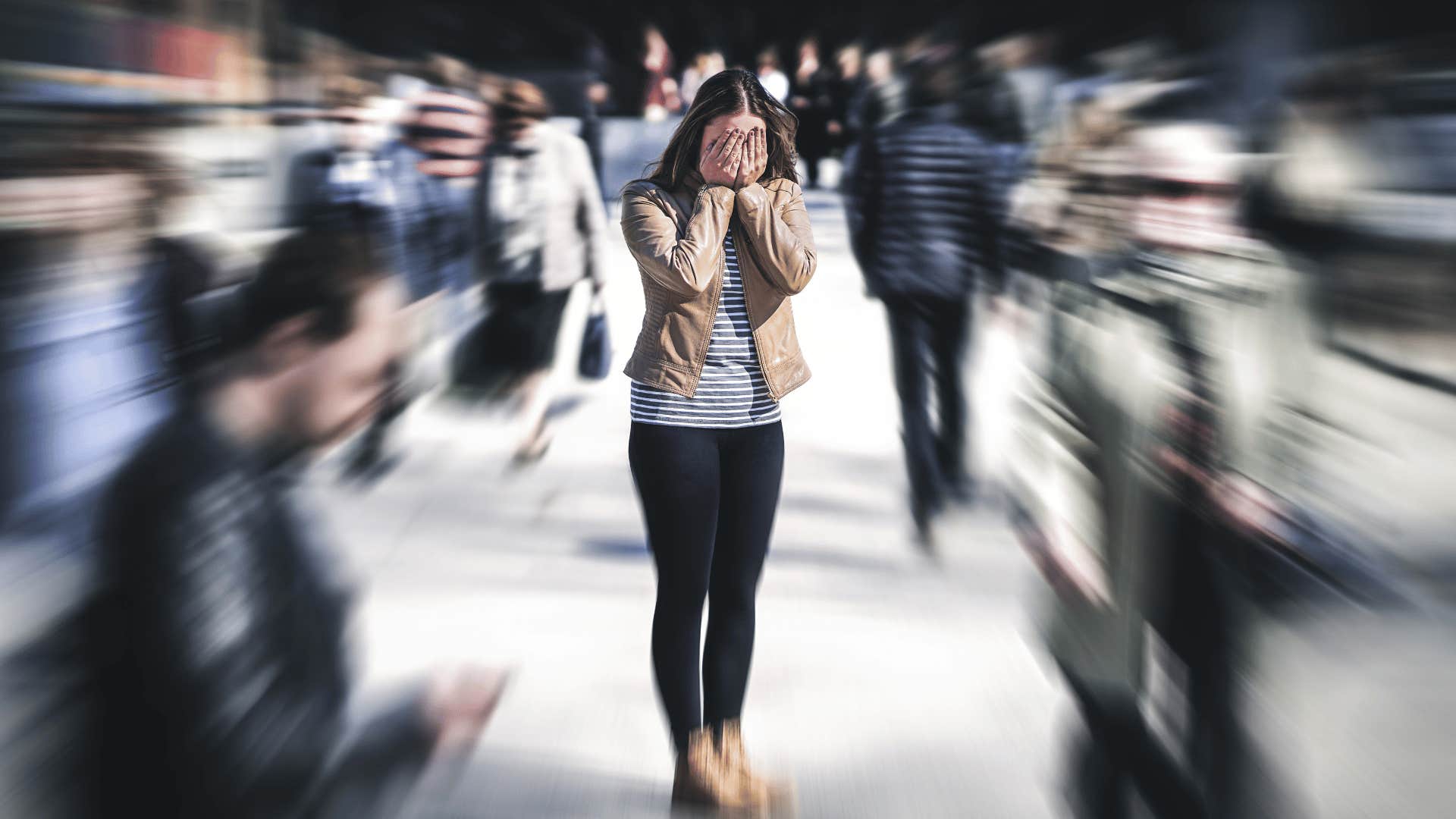 embarrassed woman in a crowd