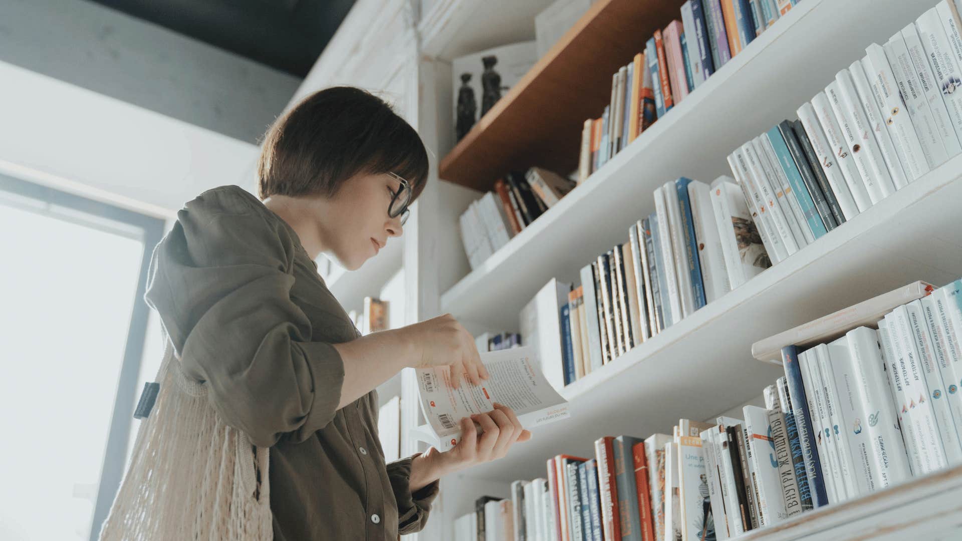 woman perusing a bookstore