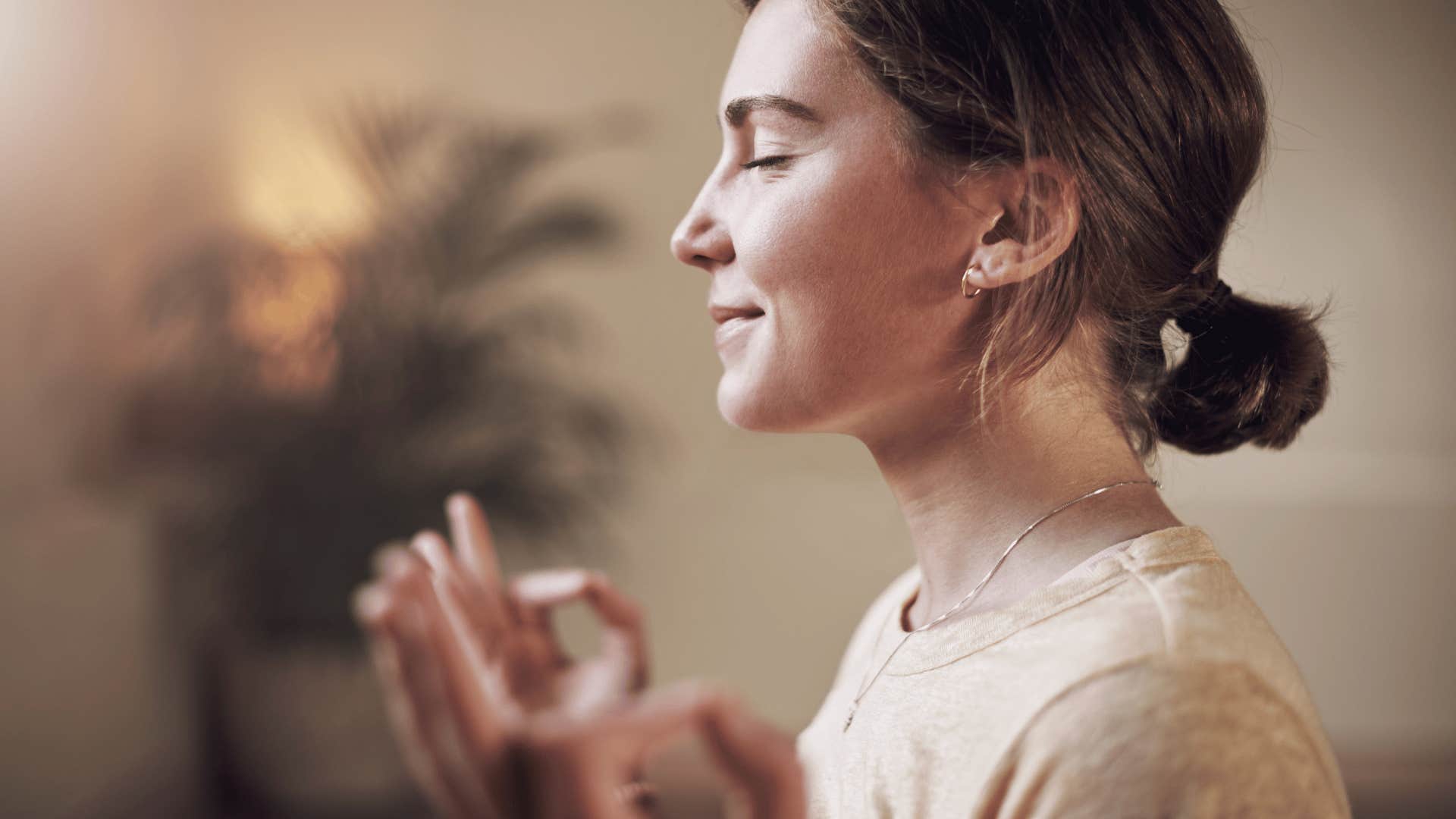 side profile of woman meditating