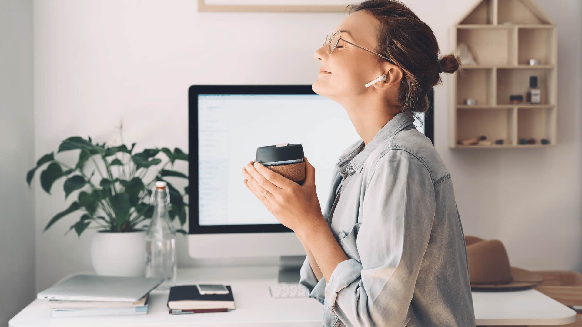 woman with eyes closed with minimalist lifestyle