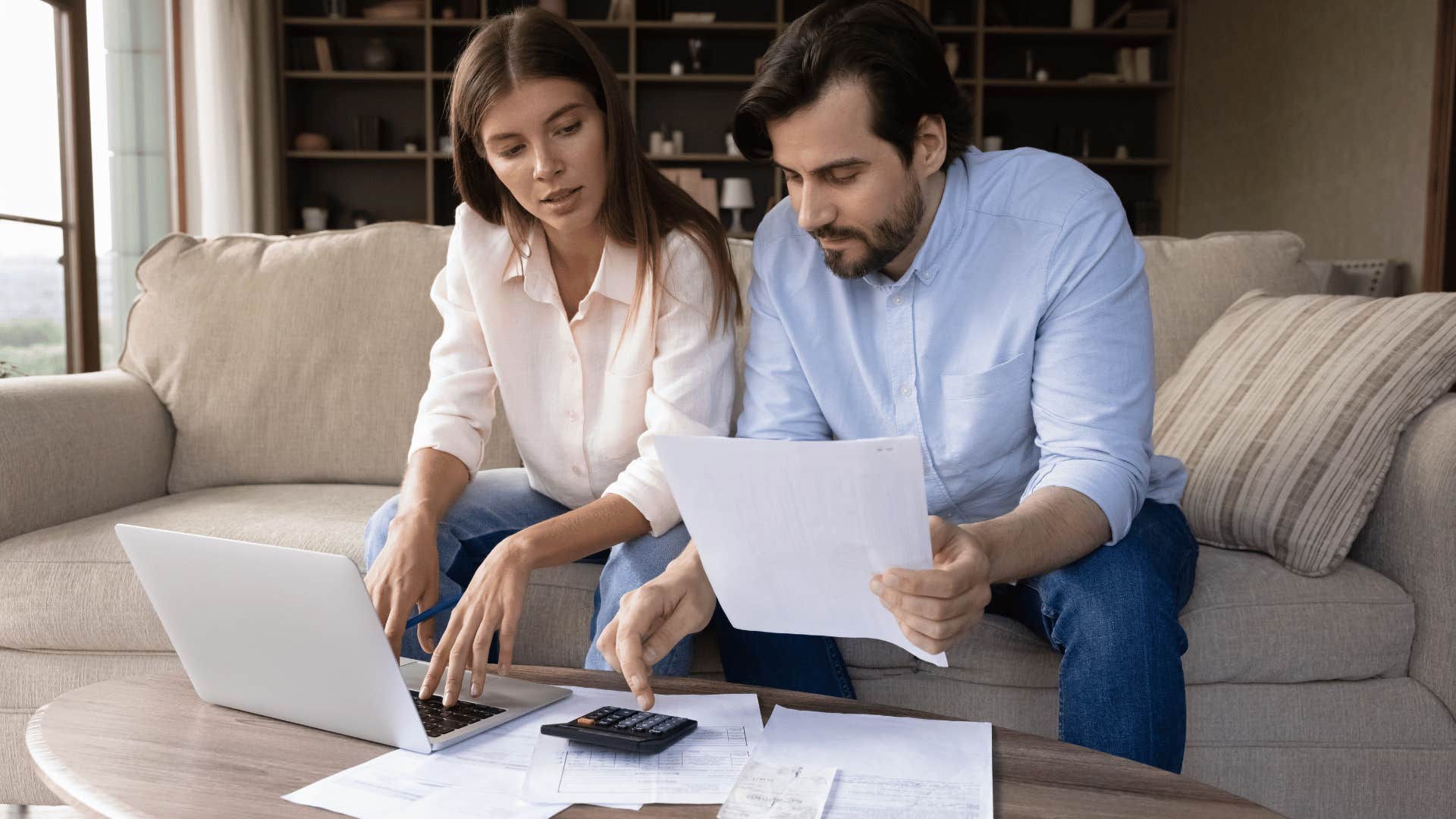 couple calculating finances