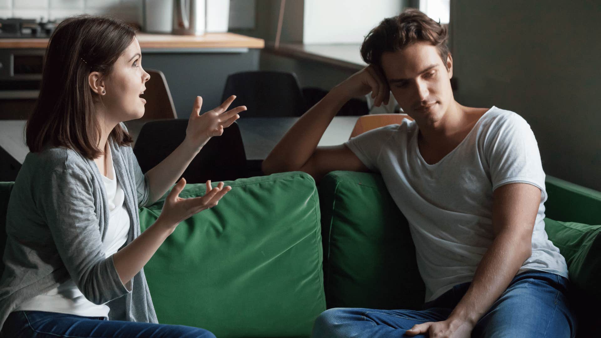 woman talking to man who is not listening