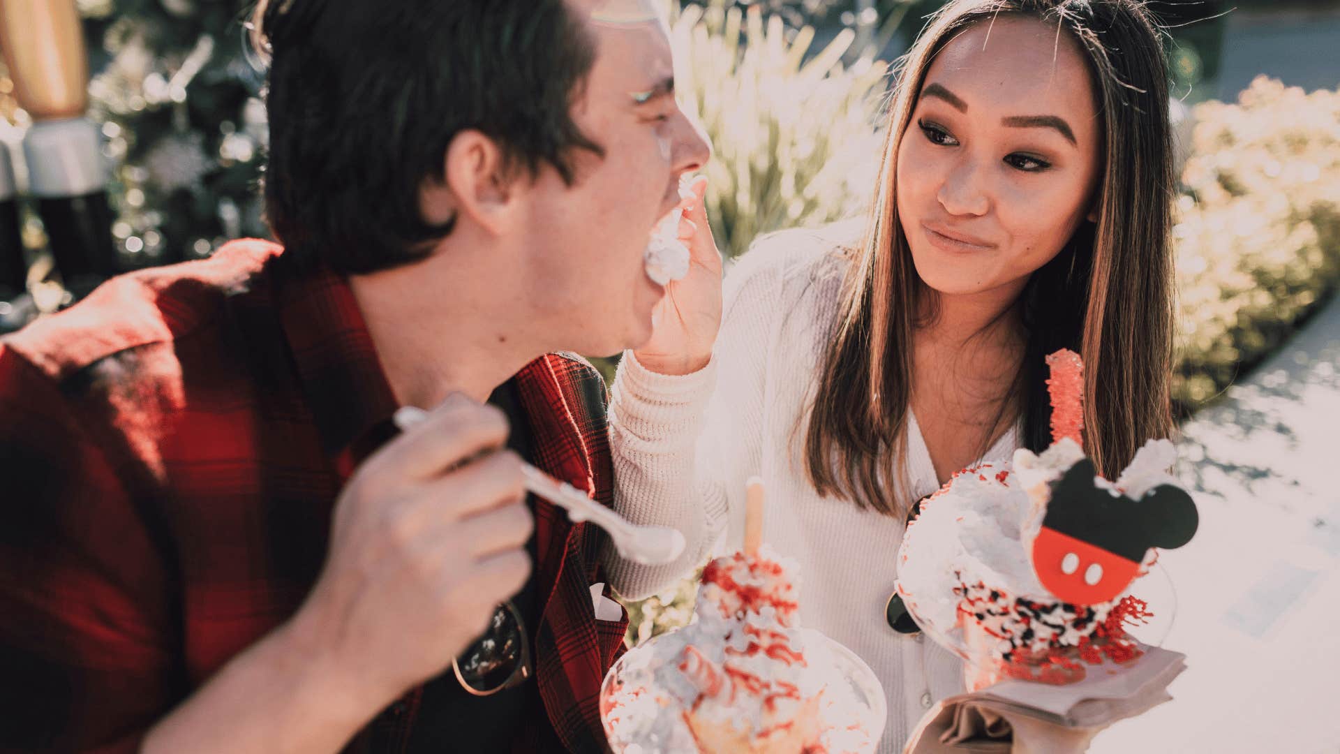 couple sharing sweet treats together