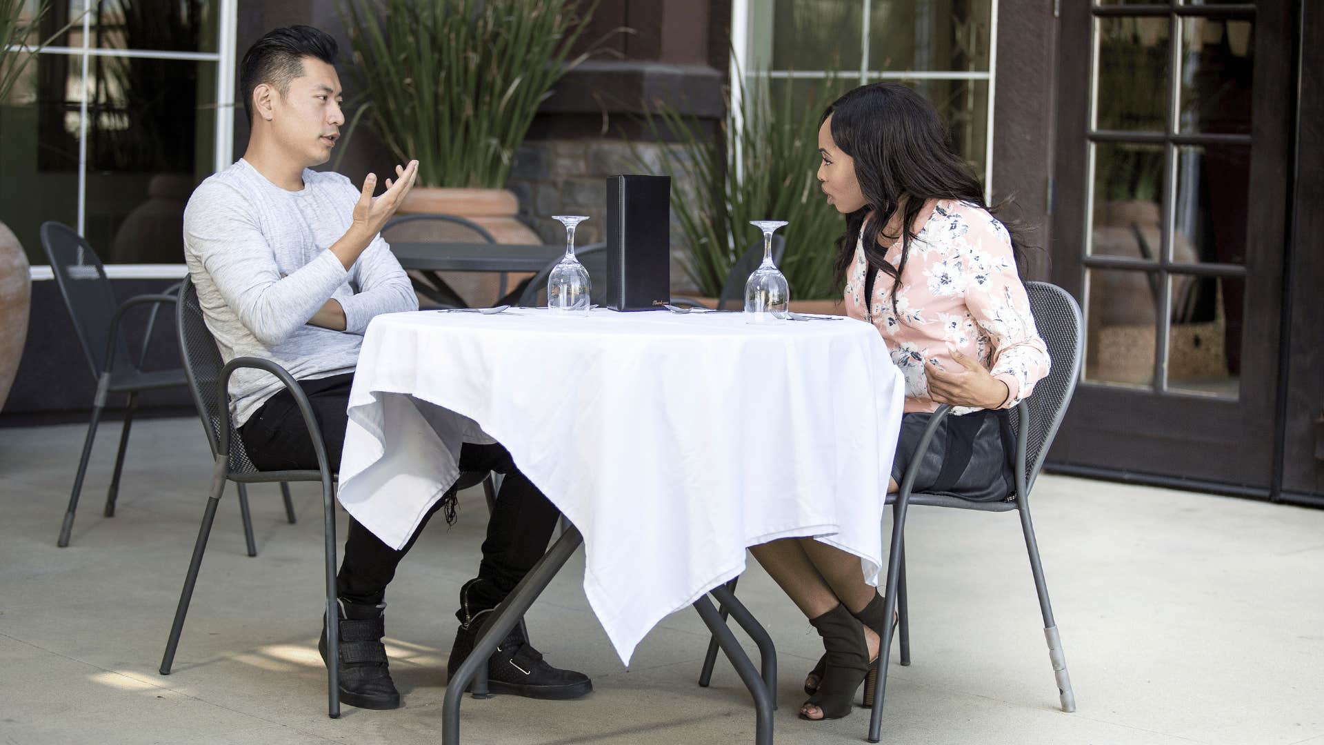 couple in outdoor seating at restaurant