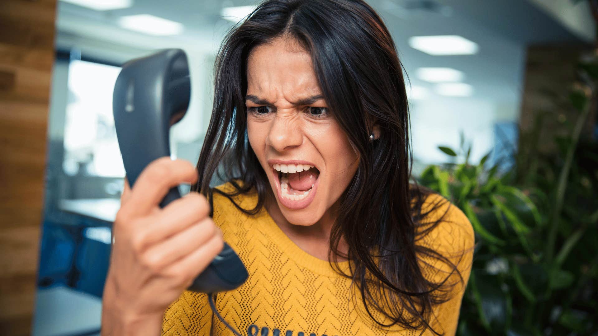 woman yelling on a phone call