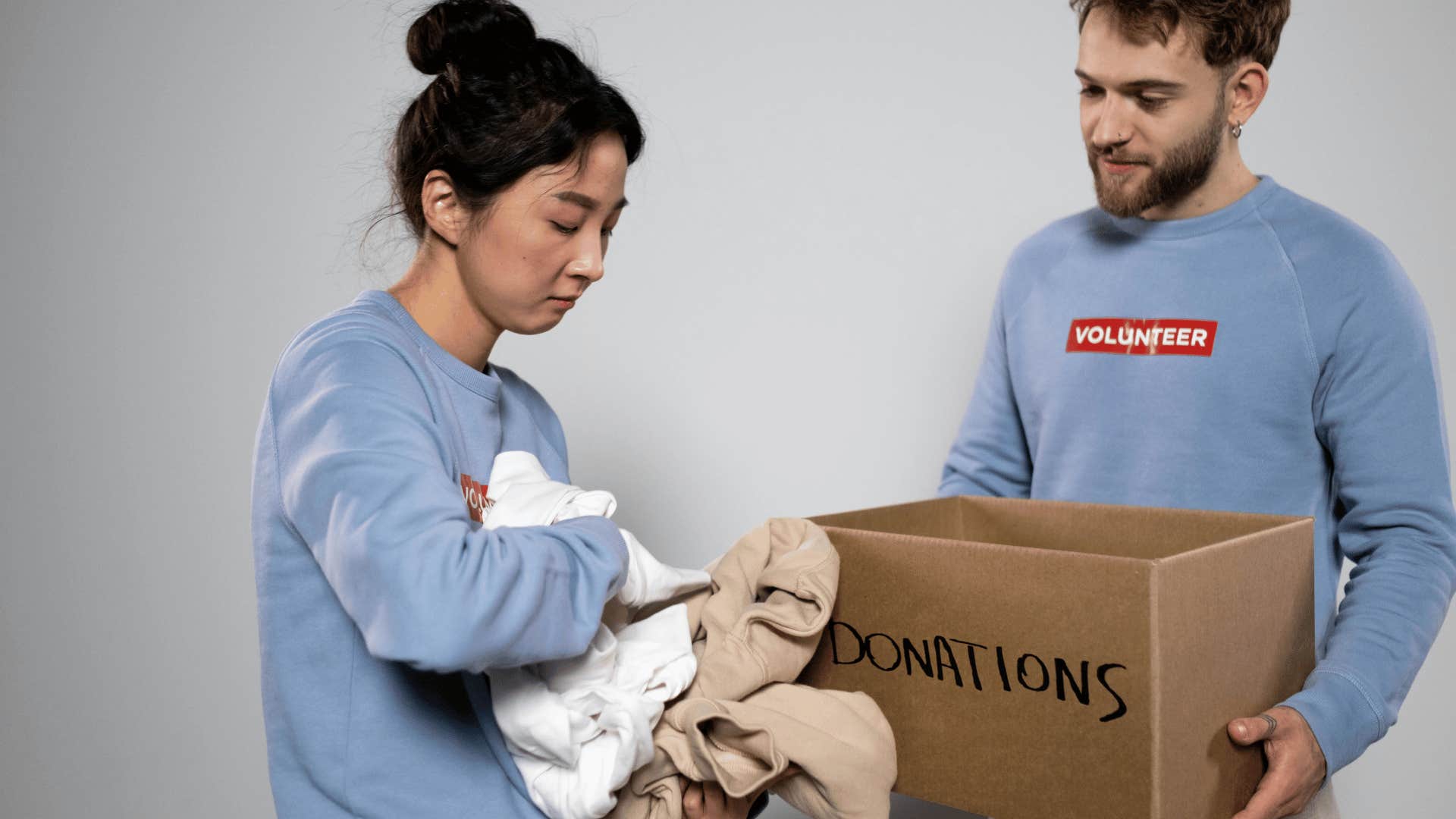 volunteers collecting donation clothes