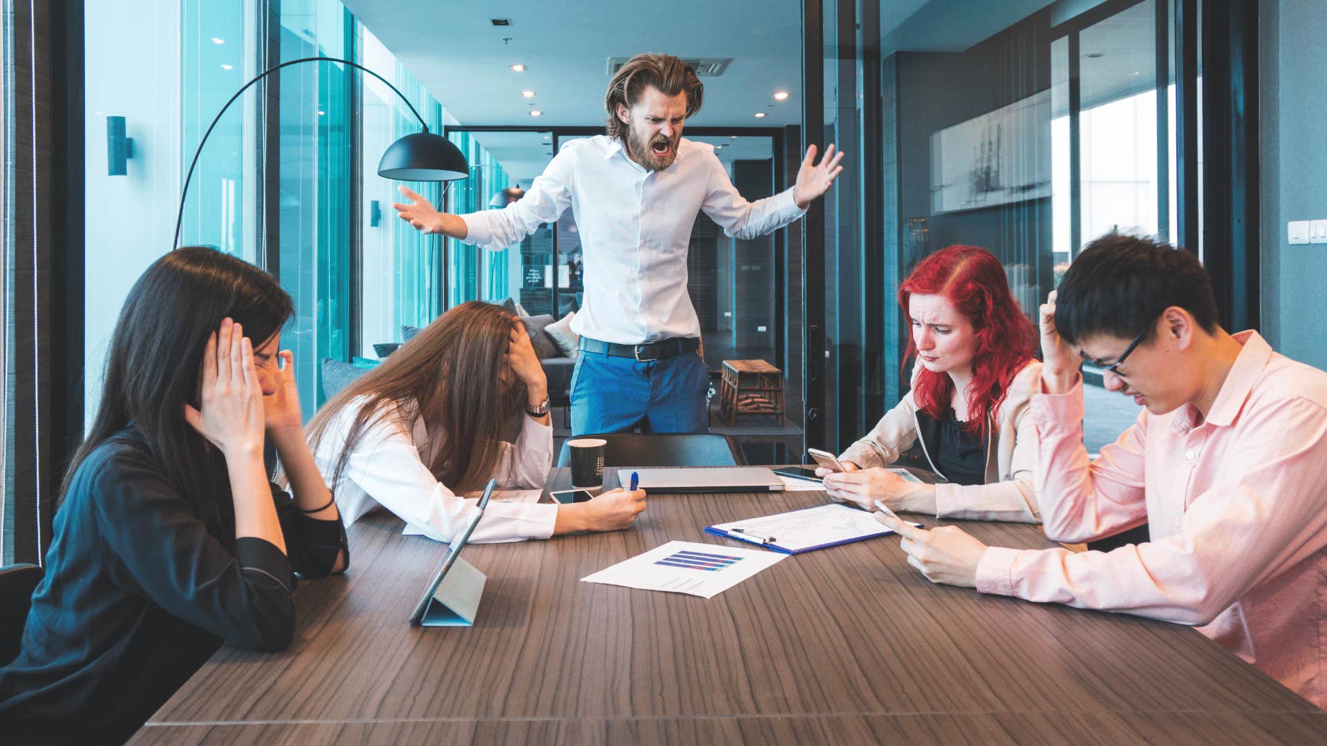 angry man yelling in a meeting