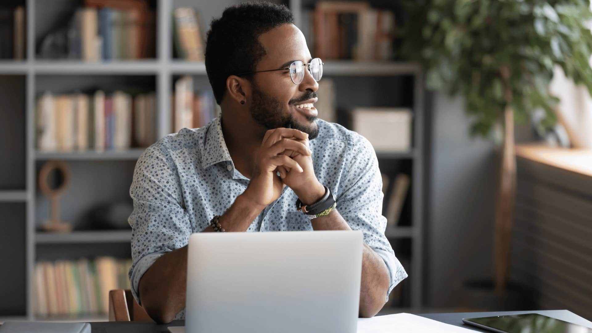 corporate man with open laptop