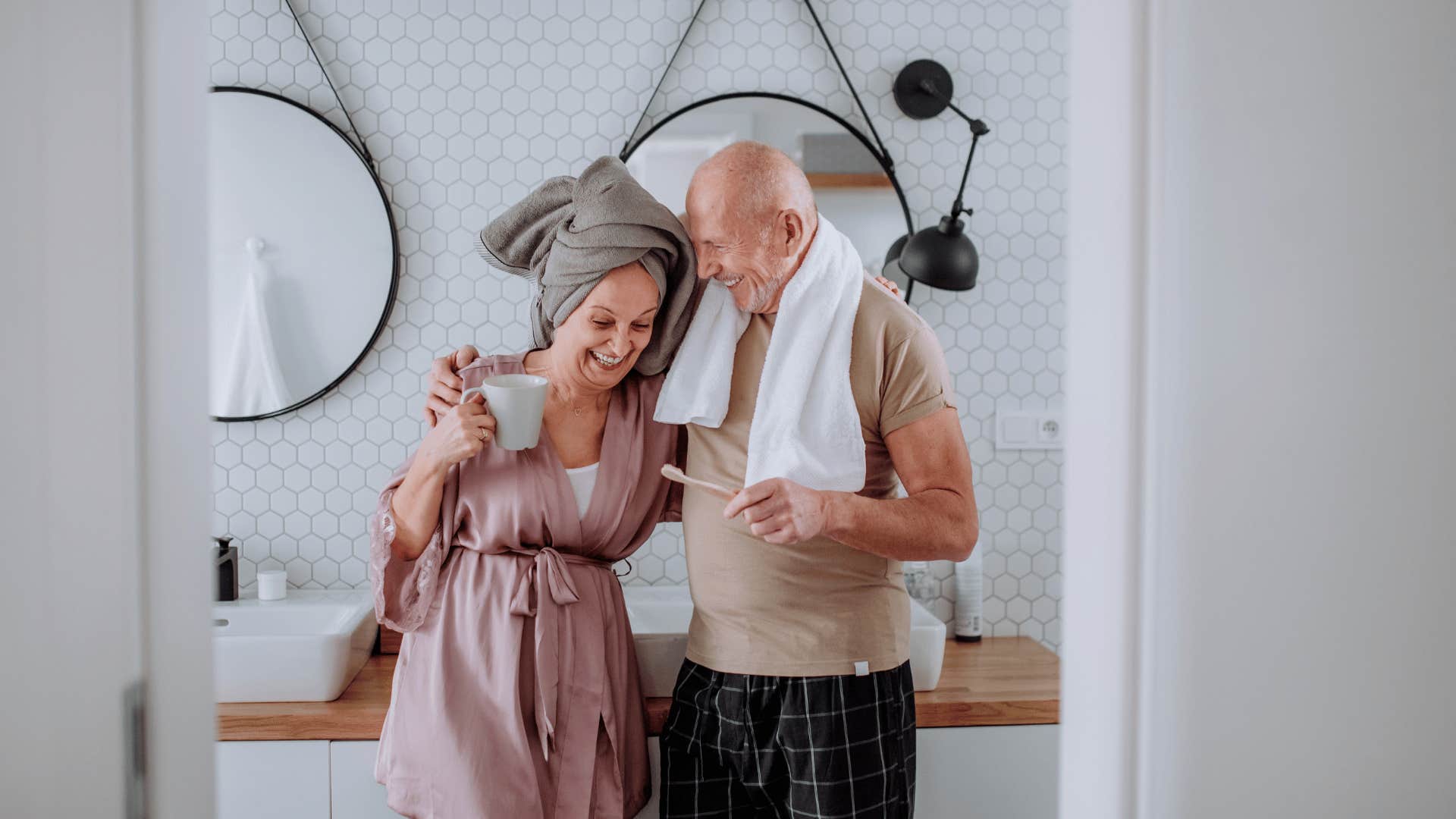 senior couple laughing in bathroom